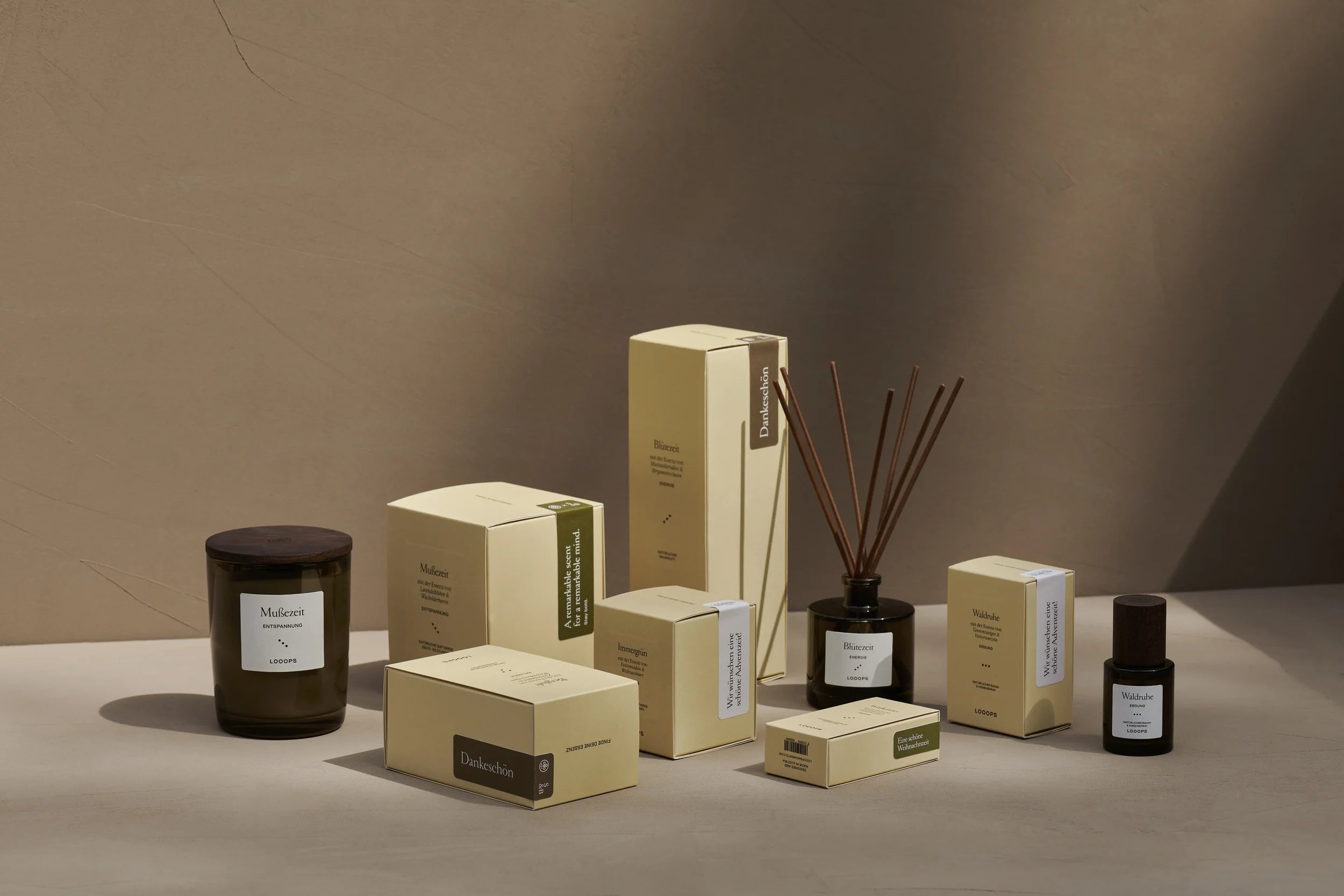 Various scented products with packaging.