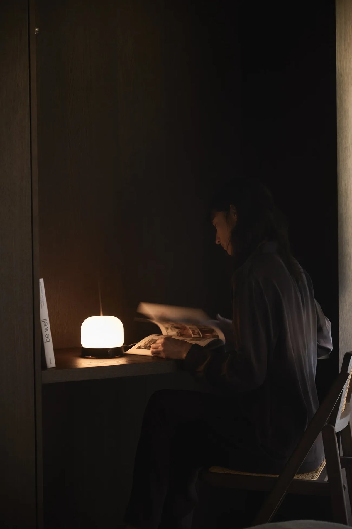 Looops 's Quint Aroma Diffuser in the bedroom, with soft lighting