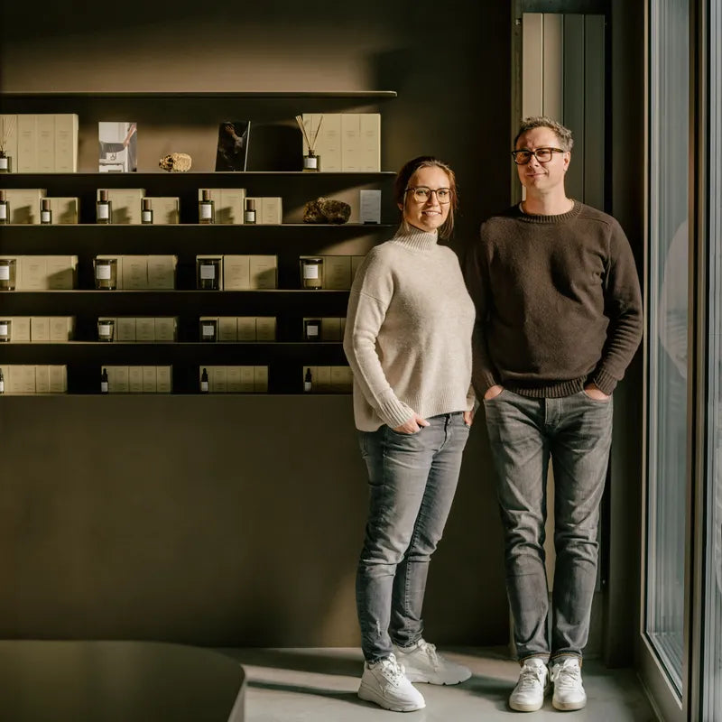 Man and woman in the candle store.