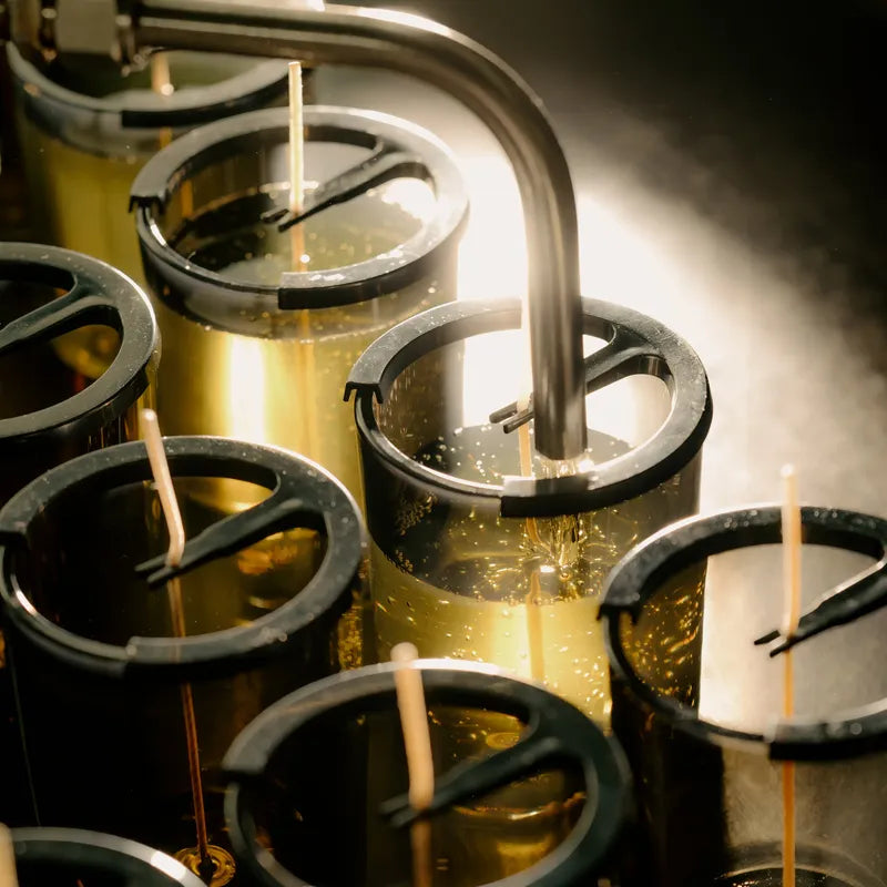 Wax is poured into jars