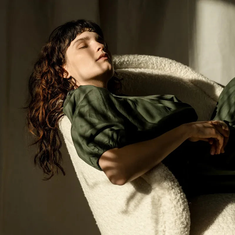 Woman sitting in chair