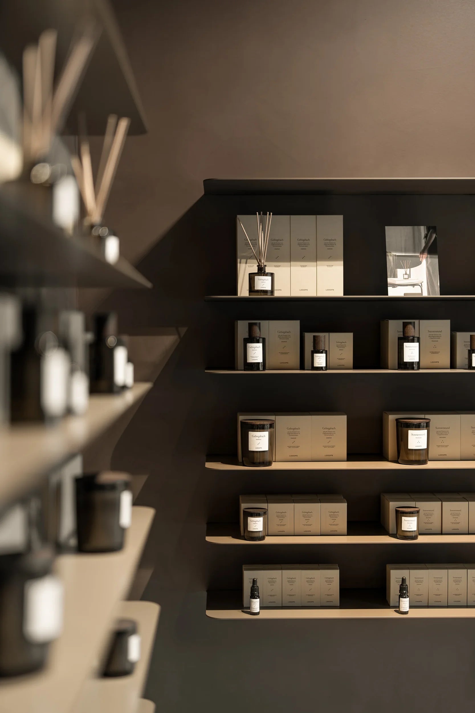 Shelves with scented candles and room fragrances