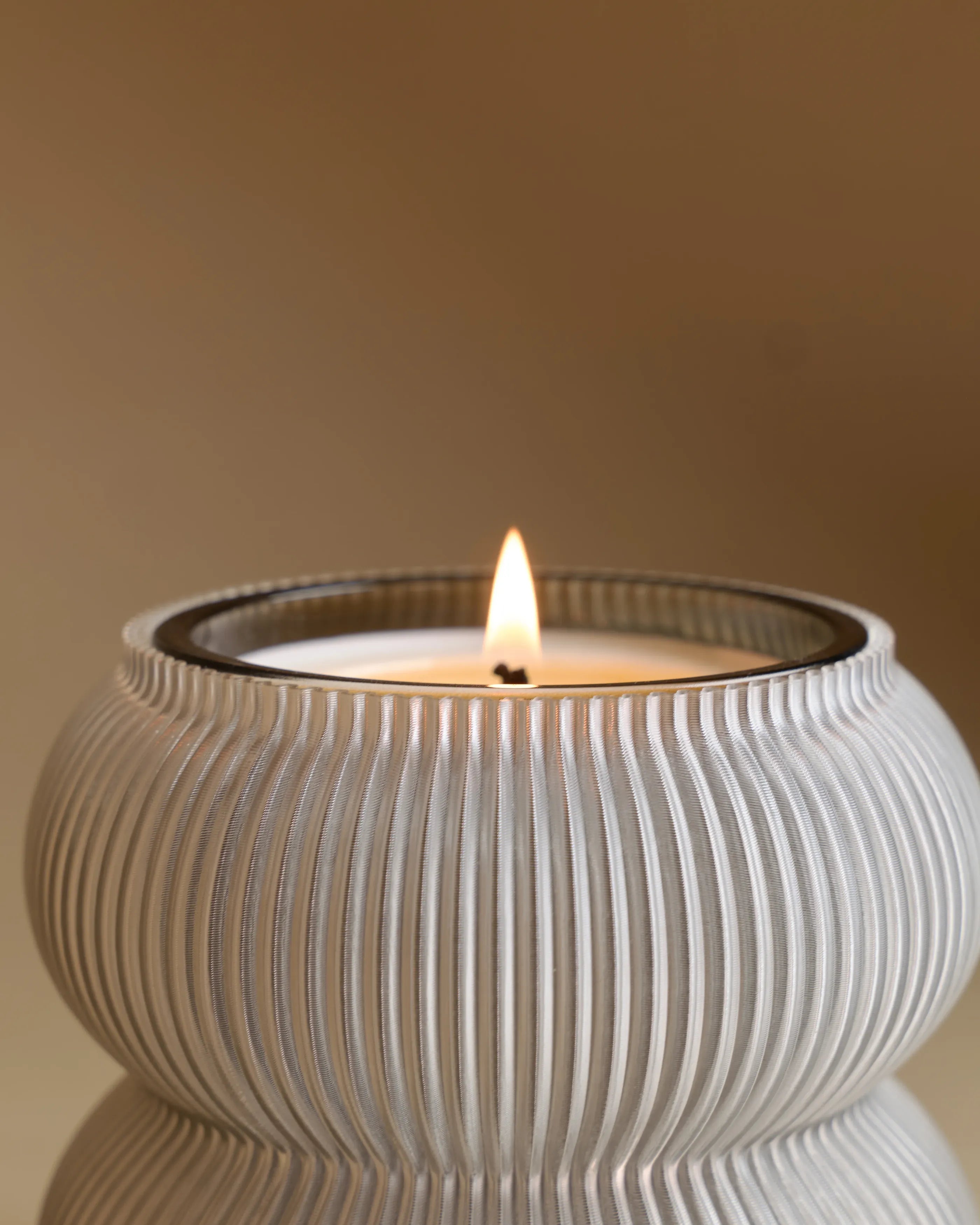 Koyl with large scented candle